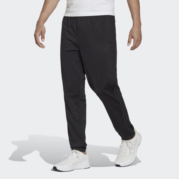 Black Adidas Essentials Warm-Up Tapered 3-Stripes Track Pants